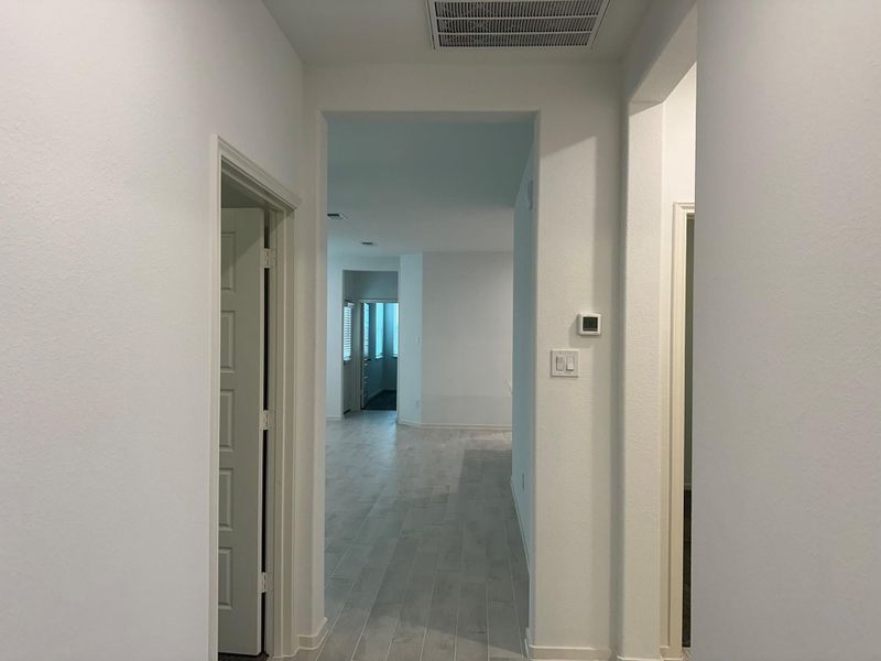 Spacious, unfurnished interior of a new home in Creekhaven, Iowa Colony (Image 10).