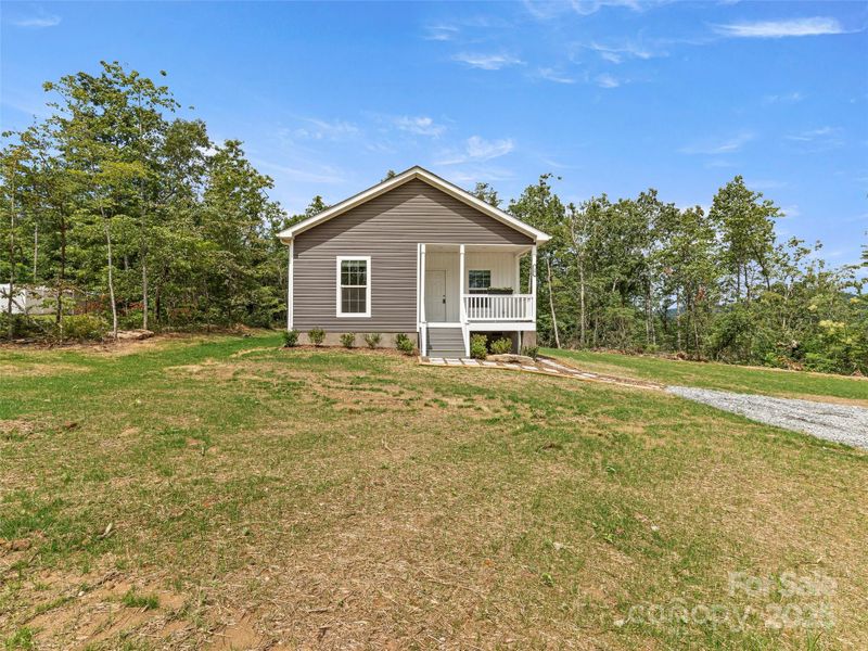 Front exterior of a new home in , Hendersonville, NC, highlighting curb appeal (Image 2).