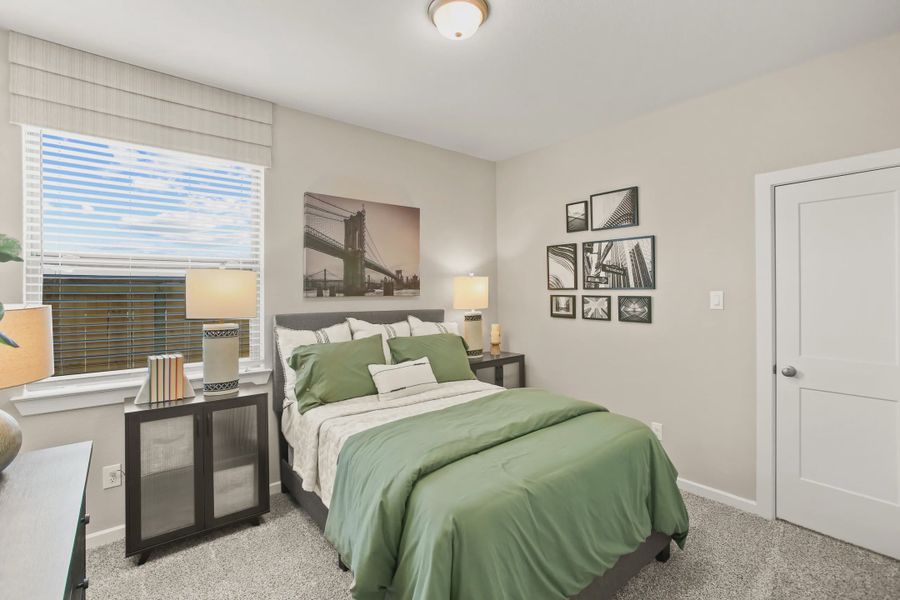 Representative furnished interior of a home built from the Summerhouse 2 by Chesmar Homes in Meridiana Townhomes, Iowa Colony (Image 14).