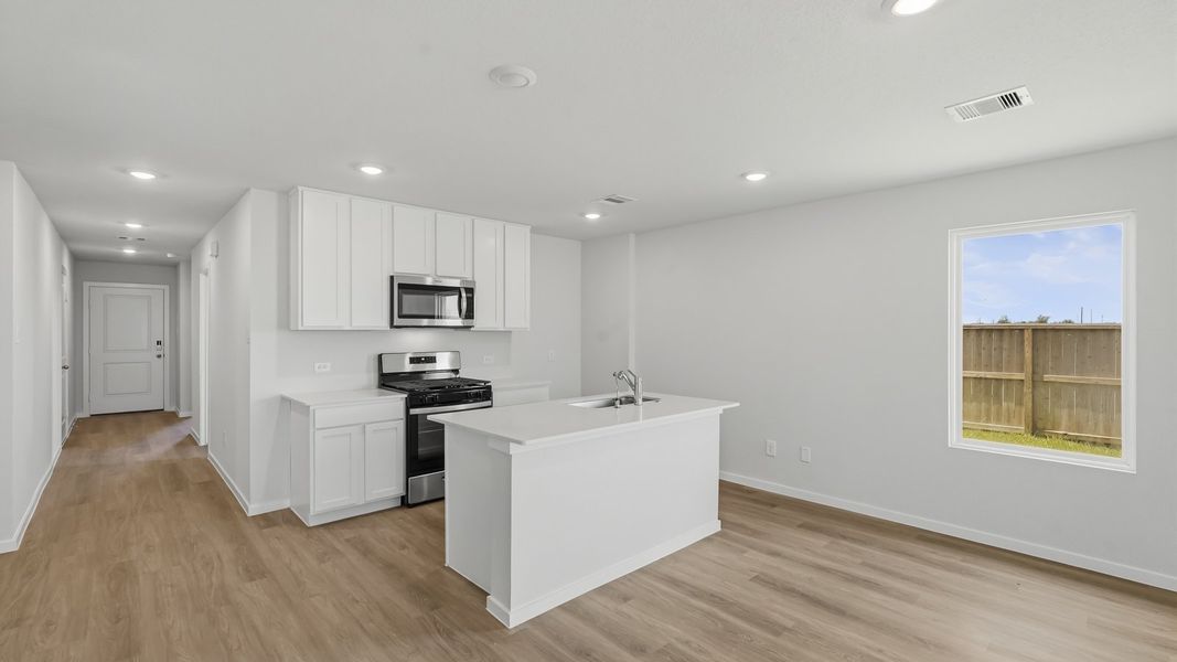 Furnished interior view inside a new home in Sunterra, Katy (Image 10).