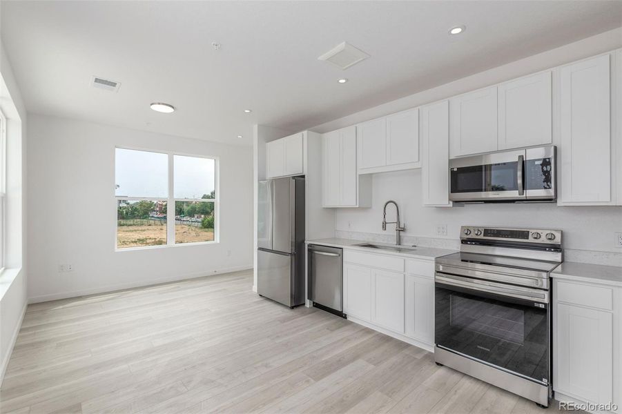 Furnished interior view inside a new home in , Denver (Image 3). Furnished interior view inside a new home in , Denver (Image 3).