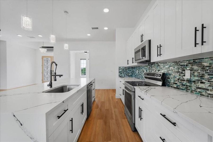 Furnished interior view inside a new home in , Port Charlotte (Image 32).