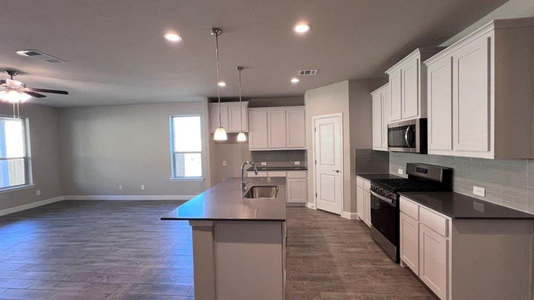 Furnished interior view inside a new home in Bluestem, Rhome (Image 5). Furnished interior view inside a new home in Bluestem, Rhome (Image 5).