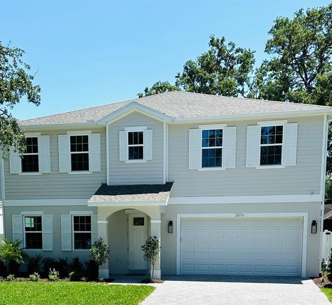 Front exterior of a new home in , Tampa, FL, highlighting curb appeal (Image 23).