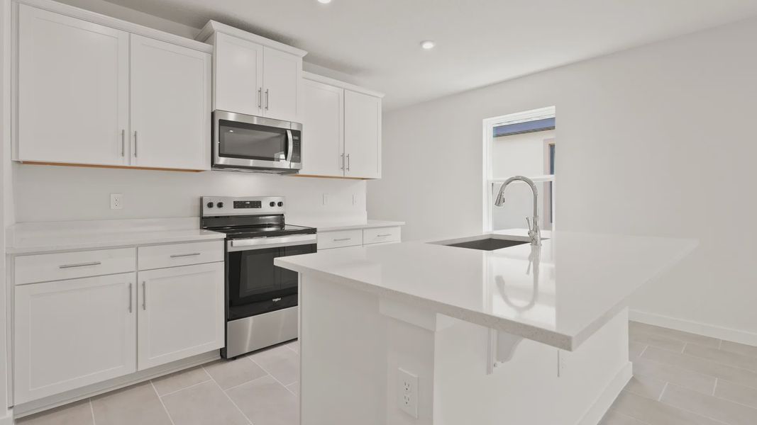 Furnished interior view inside a new home in Grasslands West, Lakeland (Image 6).