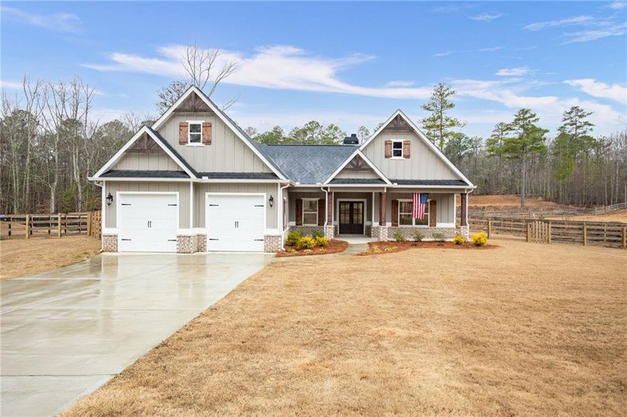 Front exterior of a new home in , Dallas, GA, highlighting curb appeal (Image 27).
