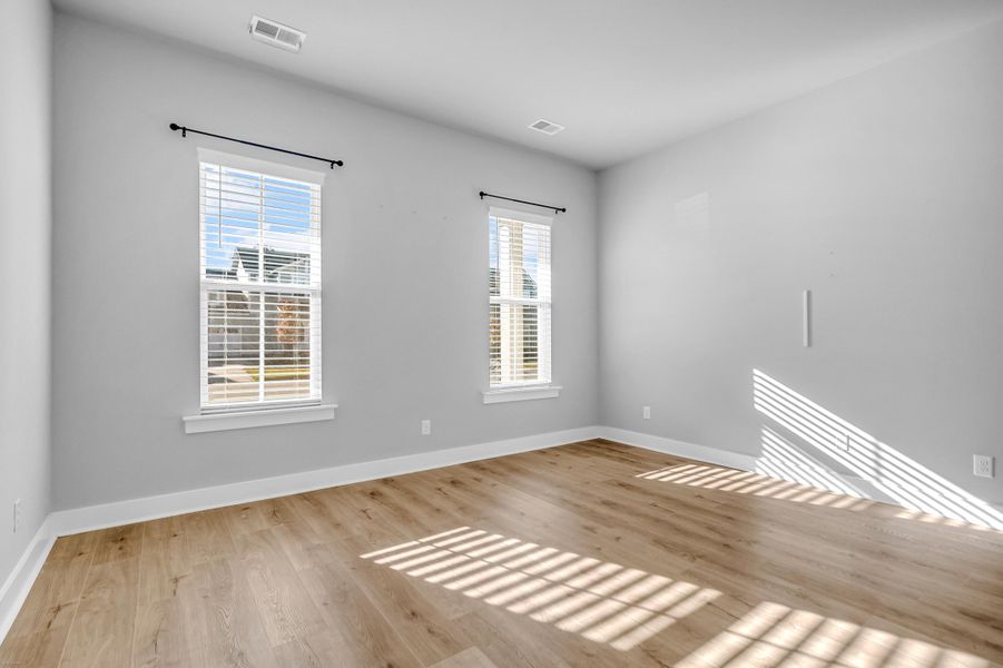 Spacious, unfurnished interior of a new home in Carnes Crossroads: Row Collection, Summerville (Image 33). Spacious, unfurnished interior of a new home in Carnes Crossroads: Row Collection, Summerville (Image 33).