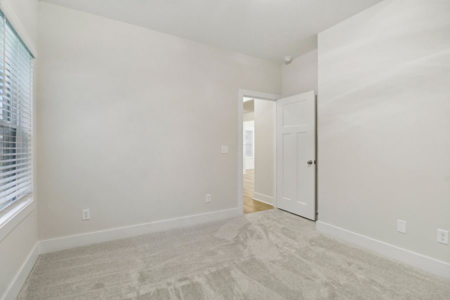 Representative unfurnished interior of a home built from the Ariel II by Great Southern Homes in Collins Cove, Chapin (Image 44).