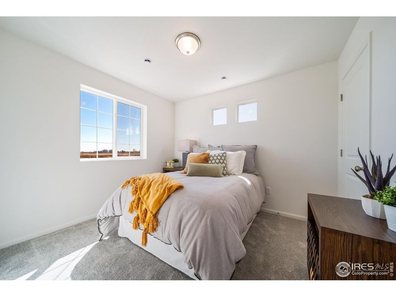 Furnished interior view inside a new home in Thompson River Ranch, Johnstown (Image 22).