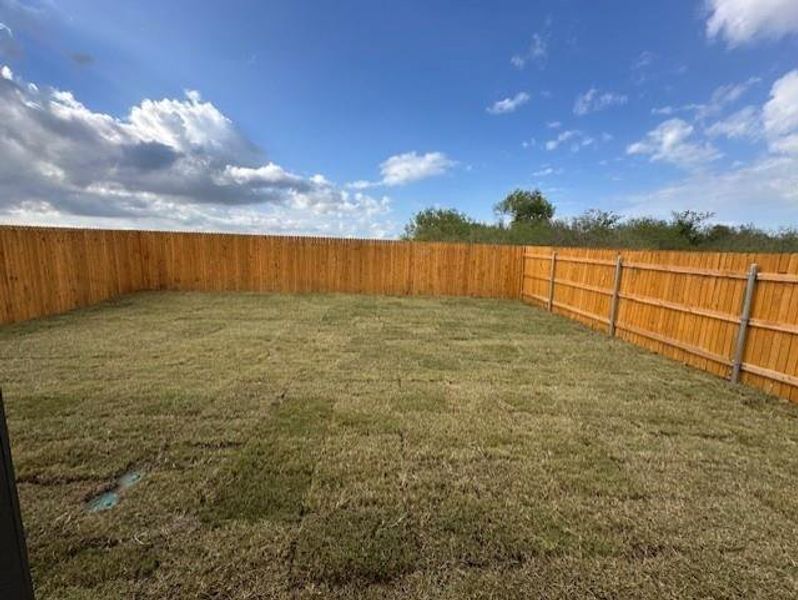 Exterior details and patio area of a home in Trinity Ranch, Elgin (Image 3). Exterior details and patio area of a home in Trinity Ranch, Elgin (Image 3).
