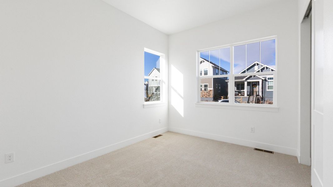 Furnished interior view inside a new home in Dillon Pointe - Journey, Broomfield (Image 6).