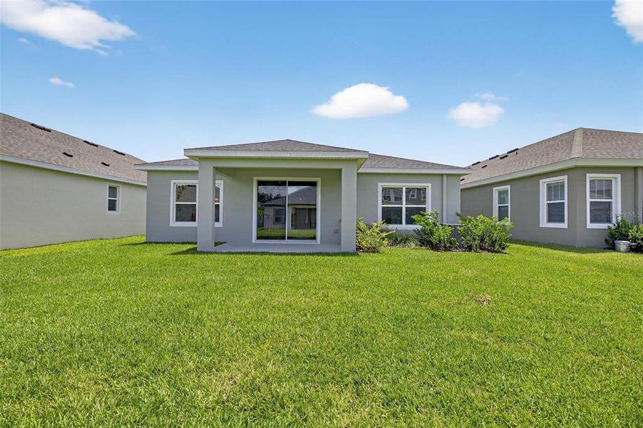 Front exterior of a new home in Waterset, Apollo Beach, FL, highlighting curb appeal (Image 26).