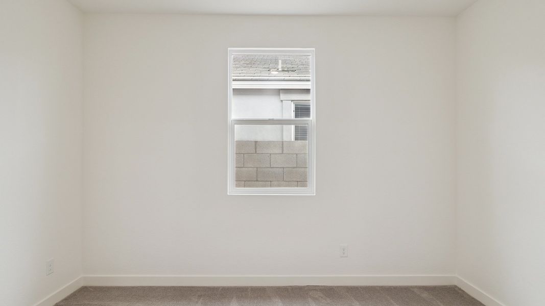 Spacious, unfurnished interior of a new home in The Ridge at Stone Butte, Phoenix (Image 22).