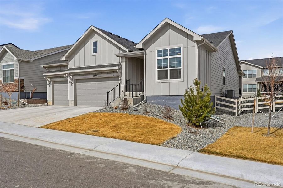 Front exterior of a new home in , Parker, CO, highlighting curb appeal (Image 20).