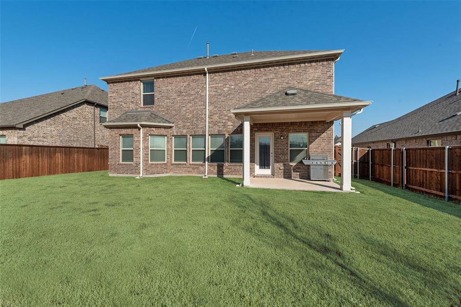 Exterior details and patio area of a home in Hunters Ridge, Crowley (Image 28).