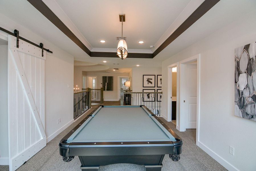 Furnished interior view inside a new home in Bridgeland, Cypress (Image 23).