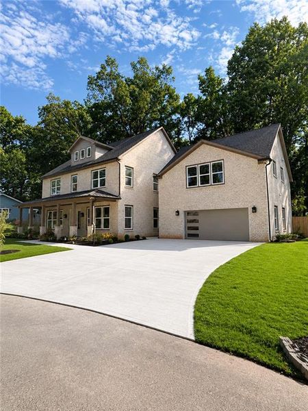 Front exterior of a new home in , Dacula, GA, highlighting curb appeal (Image 2). Front exterior of a new home in , Dacula, GA, highlighting curb appeal (Image 2).