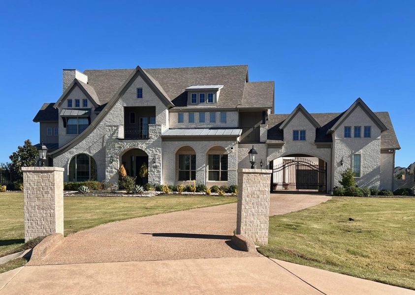 Representative exterior photo of a completed home built from the Hamptons by Grand Homes in Kings Crossing, Parker, TX (Image 23). Representative exterior photo of a completed home built from the Hamptons by Grand Homes in Kings Crossing, Parker, TX (Image 23).