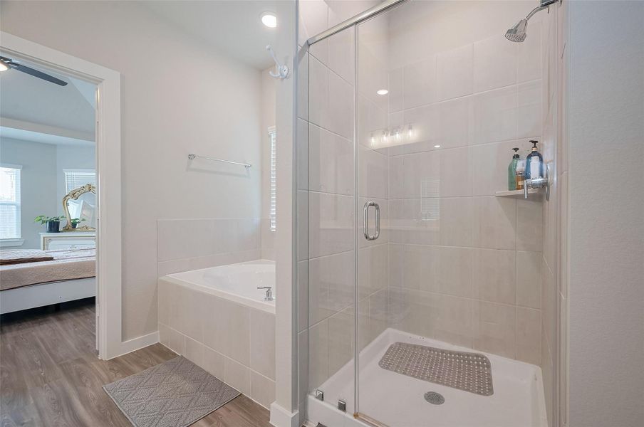 Full bathroom with clean finishes.