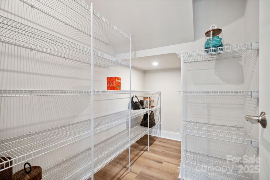 Generously Sized Walk-In Pantry. *Model Photos | Actual Finishes, Structural Selections, and Orientation May Vary.