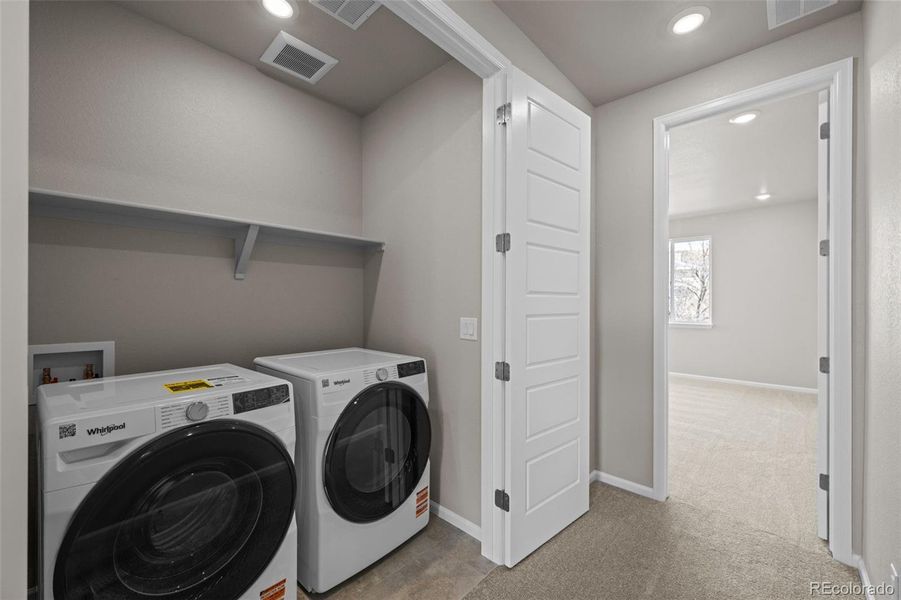 Furnished interior view inside a new home in Ralston Creek, Arvada (Image 9).