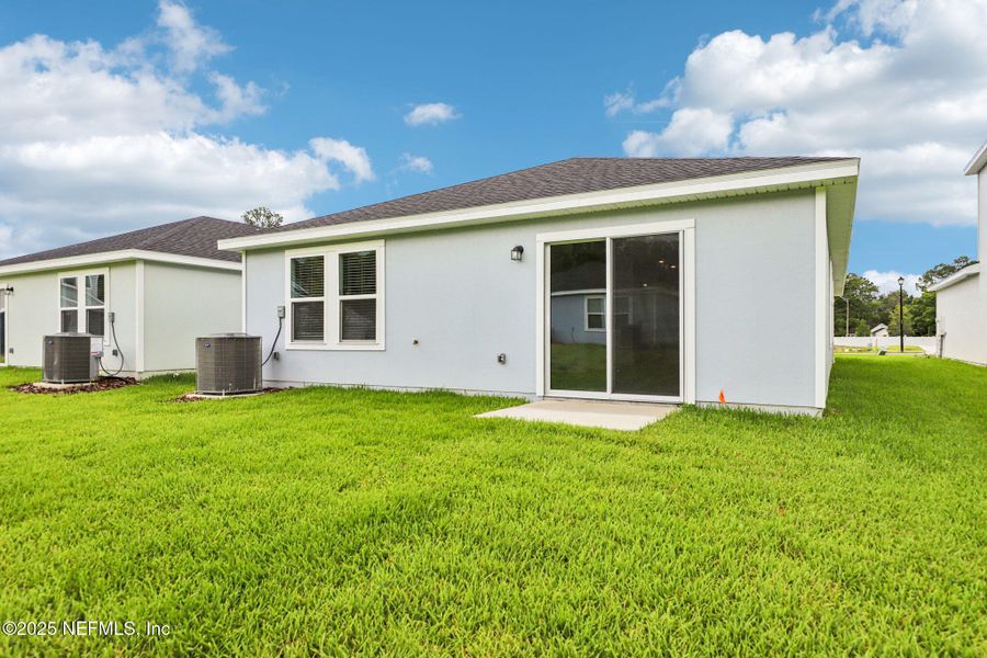 Front exterior of a new home in Kings Crossing, Jacksonville, FL, highlighting curb appeal (Image 16). Front exterior of a new home in Kings Crossing, Jacksonville, FL, highlighting curb appeal (Image 16).