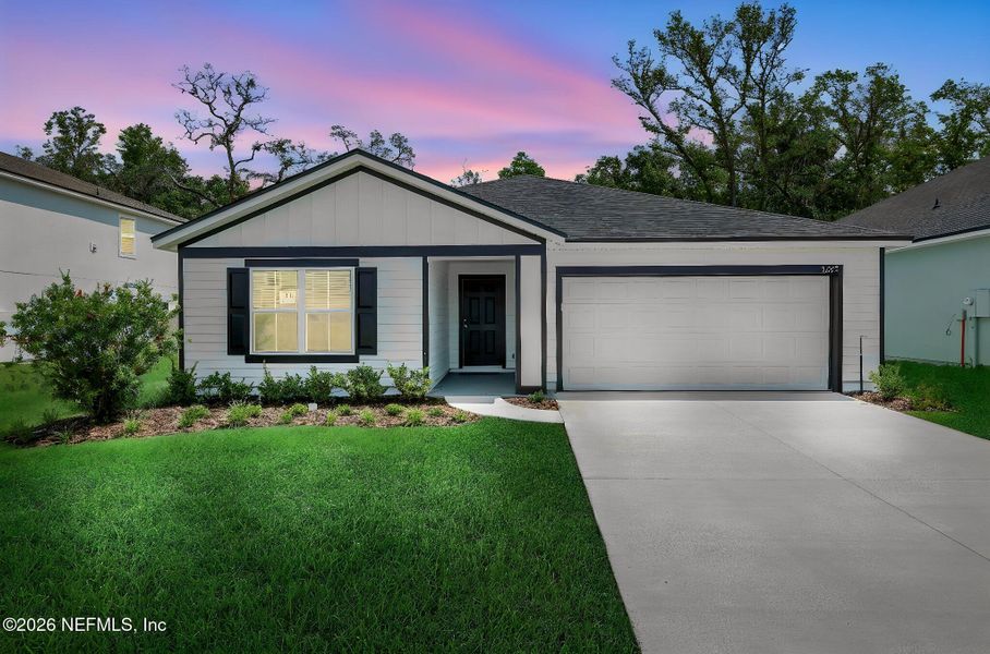 Front exterior of a new home in Wilford Oaks, Orange Park, FL, highlighting curb appeal (Image 23). Front exterior of a new home in Wilford Oaks, Orange Park, FL, highlighting curb appeal (Image 23).