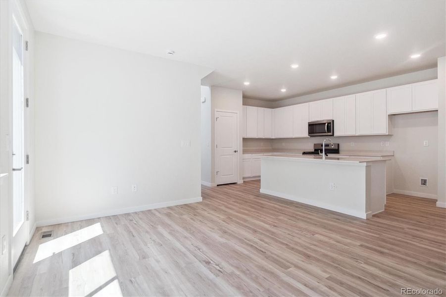 Furnished interior view inside a new home in Paired Homes at Alder Creek, Parker (Image 3). Furnished interior view inside a new home in Paired Homes at Alder Creek, Parker (Image 3).