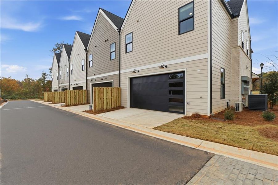 Front exterior of a new home in , Braselton, GA, highlighting curb appeal (Image 25). Front exterior of a new home in , Braselton, GA, highlighting curb appeal (Image 25).