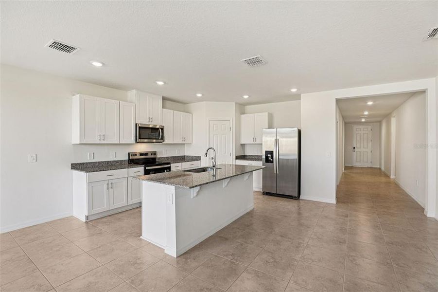 Furnished interior view inside a new home in Lawson Dunes - Signature Series, Haines City (Image 12). Furnished interior view inside a new home in Lawson Dunes - Signature Series, Haines City (Image 12).
