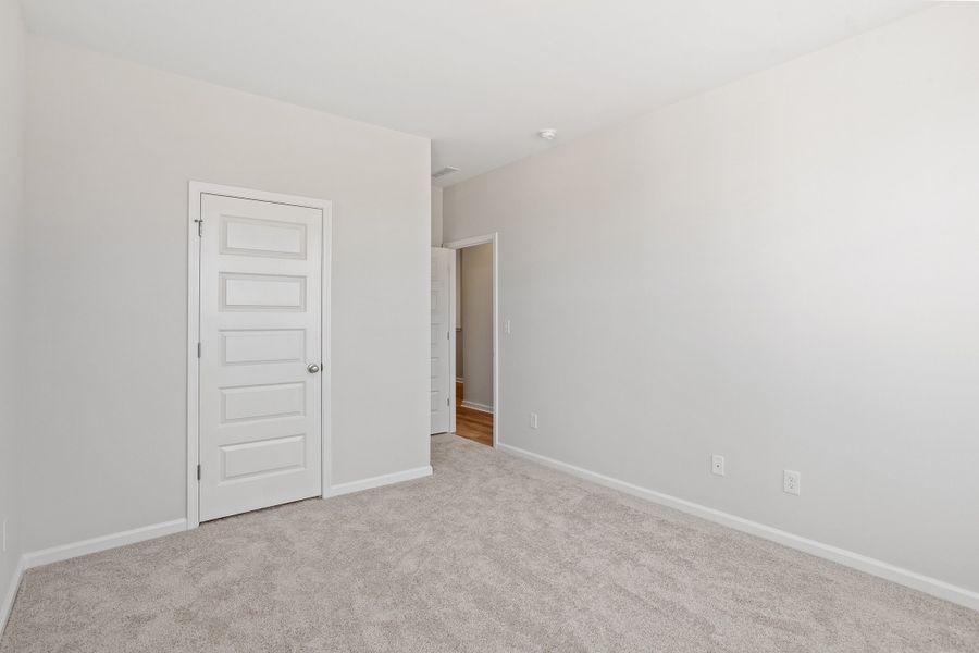 Spacious, unfurnished interior of a new home in Sweetbrier, Durham (Image 29).