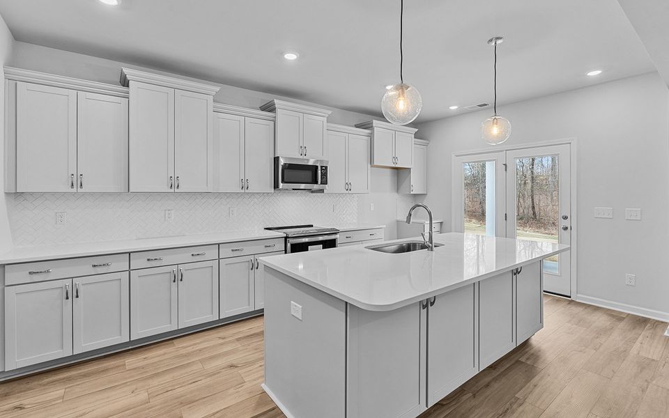 Furnished interior view inside a new home in Fieldstone, Lexington (Image 9).