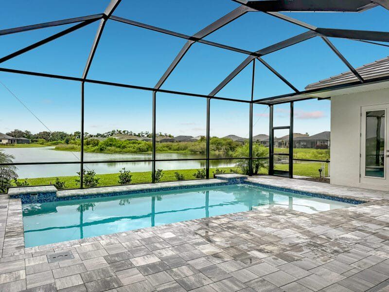 Exterior details and patio area of a home in River Preserve Estates, Parrish (Image 29).