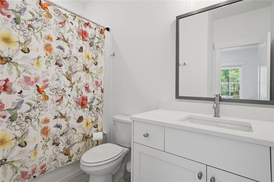 Furnished interior view inside a new home in Malone's Pond, Ball Ground (Image 39).