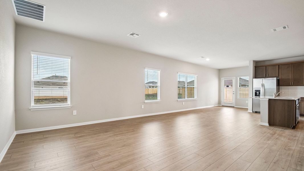 Spacious, unfurnished interior of a new home in Carillon, Manor (Image 13).