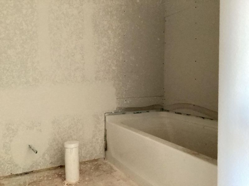 In-progress construction of a new home in The Homestead at Lariat, Liberty Hill, TX (Image 9).