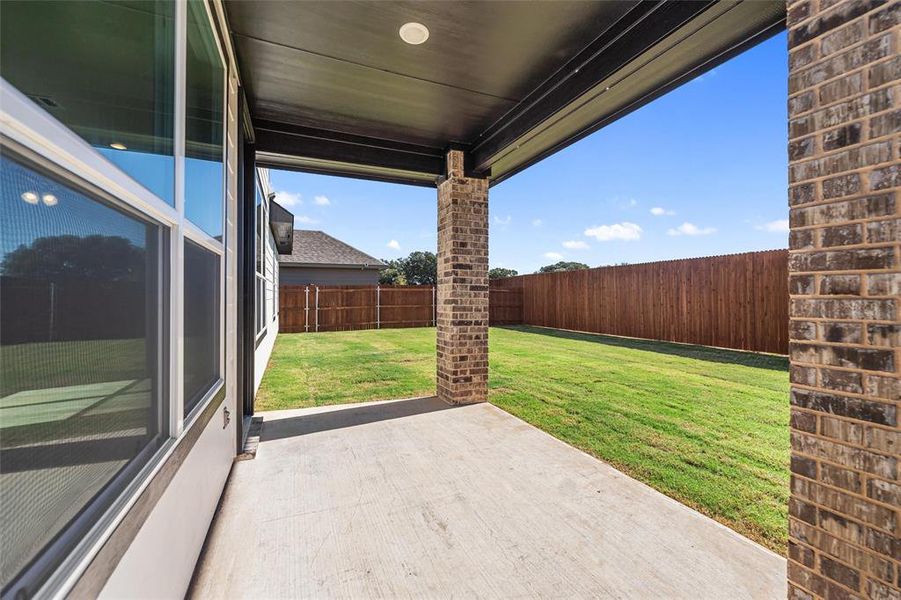 Exterior details and patio area of a home in Covenant Park, Springtown (Image 3). Exterior details and patio area of a home in Covenant Park, Springtown (Image 3).
