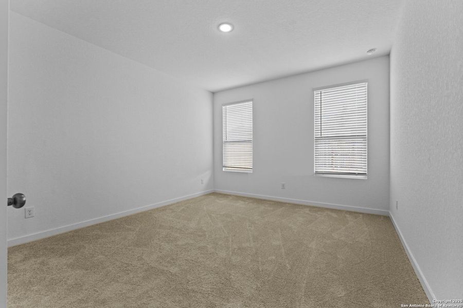 Spacious, unfurnished interior of a new home in Hidden Trails: Coastline Collection, Bulverde (Image 14).