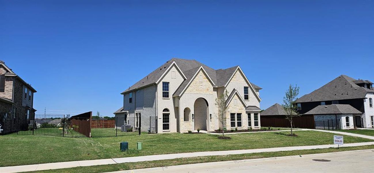 Front exterior of a new home in , Haslet, TX, highlighting curb appeal (Image 19).