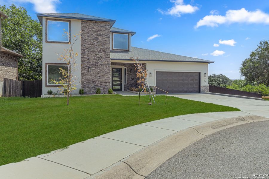 Front exterior of a new home in , San Antonio, TX, highlighting curb appeal (Image 24). Front exterior of a new home in , San Antonio, TX, highlighting curb appeal (Image 24).