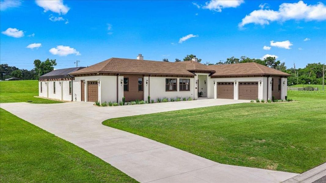 Front exterior of a new home in , Ocala, FL, highlighting curb appeal (Image 29).