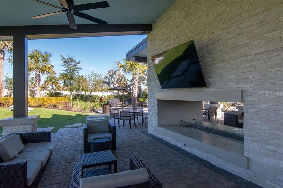 Exterior details and patio area of a home in River's Edge, Wesley Chapel (Image 24).