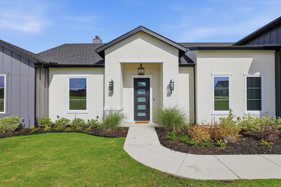 Front exterior of a new home in , Waxahachie, TX, highlighting curb appeal (Image 28).