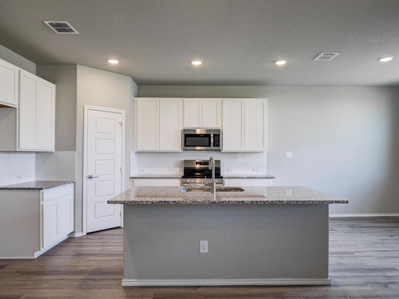 Representative furnished interior of a home built from the The Asheville E by Davidson Homes LLC in Hannah Heights, Seguin (Image 6). Representative furnished interior of a home built from the The Asheville E by Davidson Homes LLC in Hannah Heights, Seguin (Image 6).
