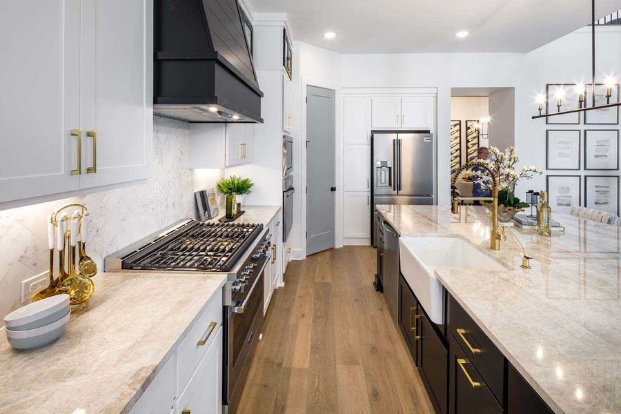 Representative furnished interior of a home built from the 222G by Highland Homes in Quail Hollow, Rockwall (Image 12).