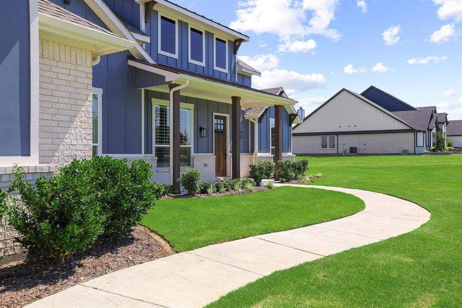 Exterior details and patio area of a home in The Meadows, Gunter (Image 25). Exterior details and patio area of a home in The Meadows, Gunter (Image 25).