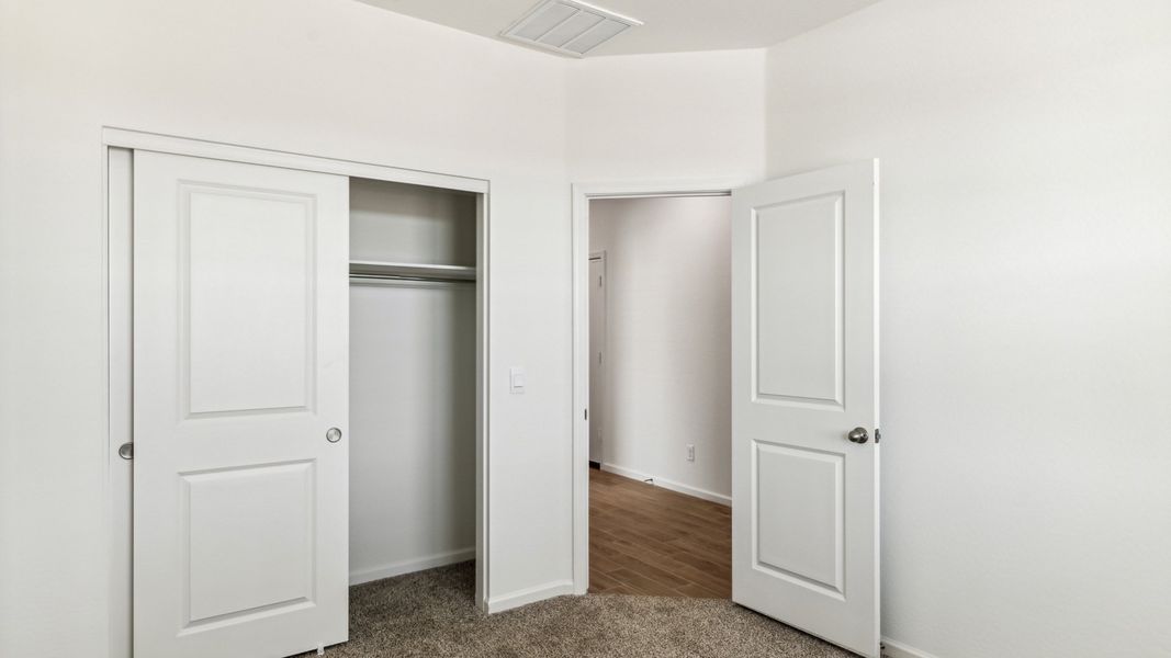 Spacious, unfurnished interior of a new home in Copper Falls, Buckeye (Image 18). Spacious, unfurnished interior of a new home in Copper Falls, Buckeye (Image 18).