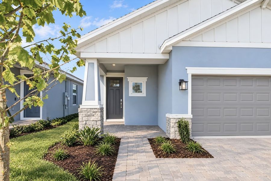 Exterior details and patio area of a home in Lochside, Mount Dora (Image 34).