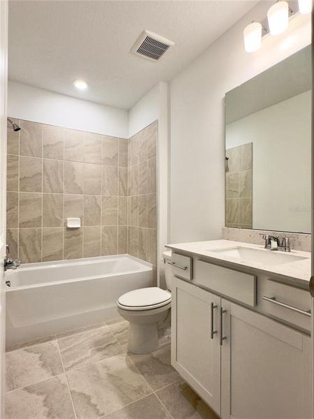 Furnished interior view inside a new home in Parkside Trails, Clermont (Image 5).