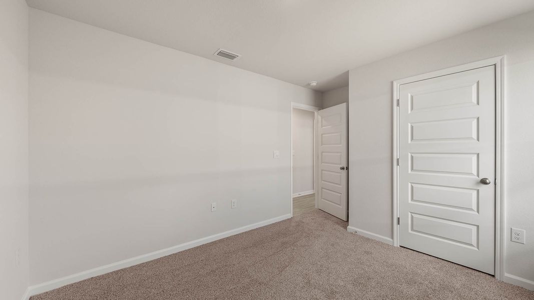 Spacious, unfurnished interior of a new home in Magnolia at the Bluffs Phase 3, Freeport (Image 20).